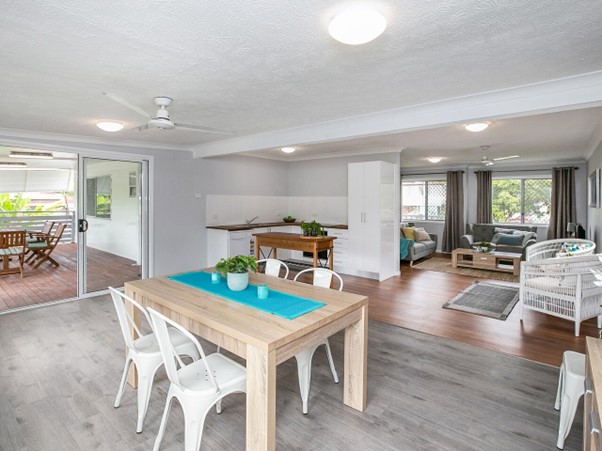 Open-plan living and dining space after renovation